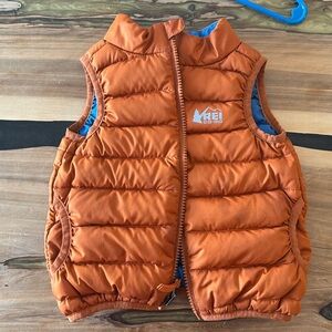 REI orange (blue) reversible- puffer vest. 18 months